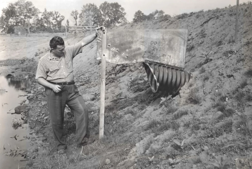 1956 image of George Clark investigating tile outlet
