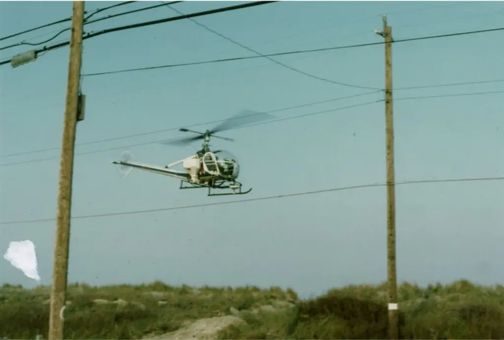 Aerial application of fertilizer on vegetated dunes.