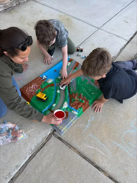 Marissa teaching children about point source pollution.